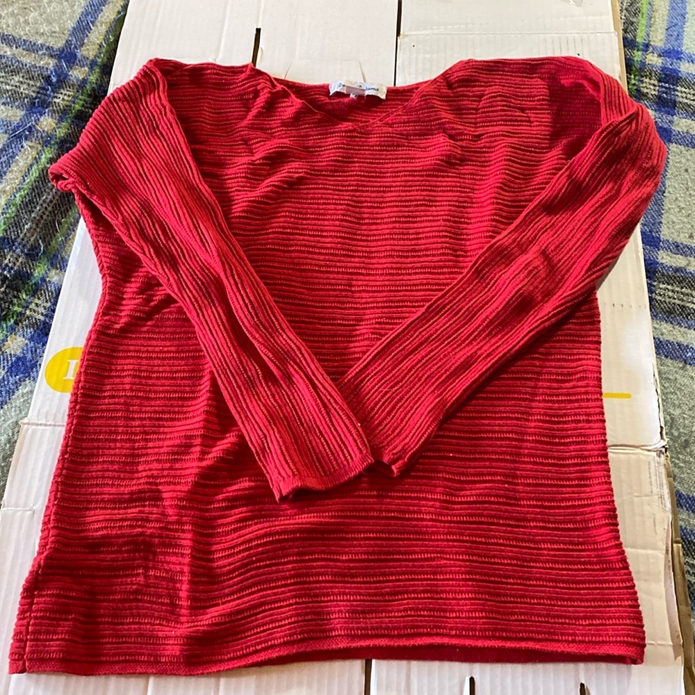 Tommy Bahama size M sweater. Red with glitter like accents.